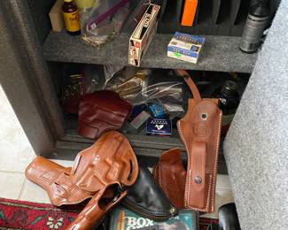 Lots of firearm accessories. Anyone looking for an Uzi holster?