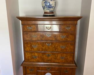 Gorgeous Baker burled veneer tall boy chest.