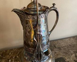 Victorian tilting coffee pot.