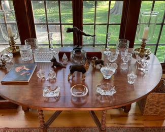 Custom Harvest Gate Leg Table (68" Round), Stueben, Baccarat, Orrefores, Fabulous Glass Hurricanes, Paul T. Grandlund Bronze, Iron Dogs, and more...