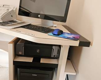 Corner office desk with printers