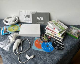 Nintendo Wii Console With Assortment Of Games And Fitness Programs