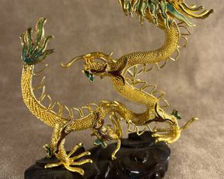 Brass dragon with jewel accents