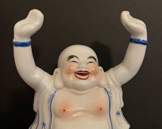 Ceramic happy buddha figurine from Japan