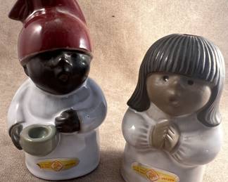 Ceramic boy and girl figurines
