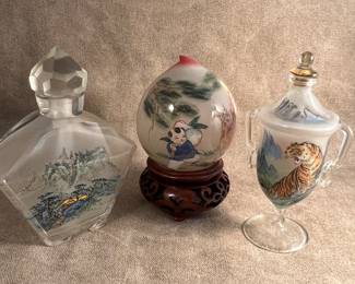 Perfume bottles and decorative egg