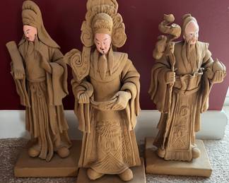 Hand carved wood Joss figurines