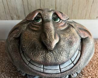 Resin grinning rock