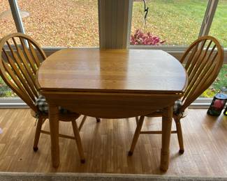 Oak drop-leaf table and 2 chairs
