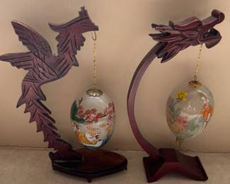 Wood dragons with painted glass eggs