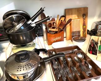 stainless steel flatware, pots and pans