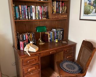 office desk with bookshelf, office chair