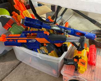 Boxes of nerf guns and ammo 