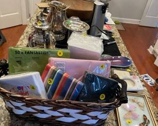Misc napkins, silver plated serving pieces, baskets,  home decor, etc.