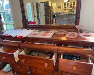 Miscellaneous placemats, napkins, pink serving pieces