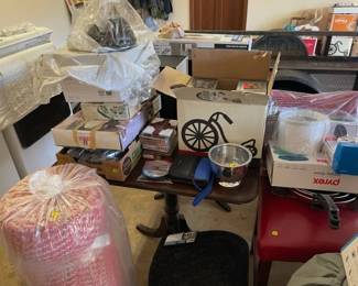 Rug, misc items and small table.