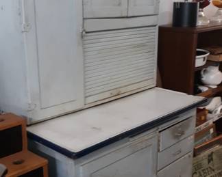 Early Hoosier cabinet with flower sifter