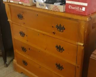 Vintage chest of drawers and other assorted furniture.
