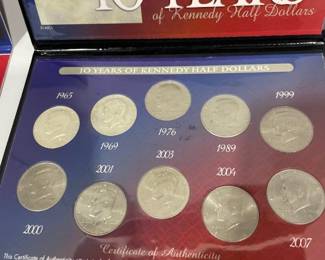 Ten years of Kennedy half dollars with founding fathers dollar coins