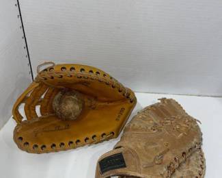 Baseball gloves and ball