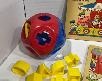 Tupperware Shape-O toy with Fisher Price wooden puzzles