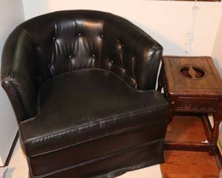 Black vinyl chair.side table
