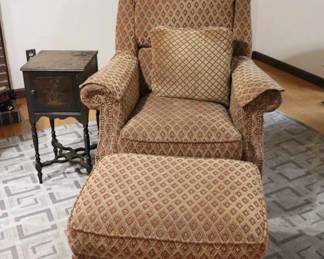 Brown patterned chair.ottoman