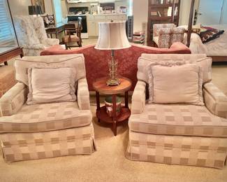 Pair of down custom upholstered lounge chairs, Baker rosewood occasional table with pierced brass gallery 