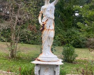 Cast iron statue and pedestal 