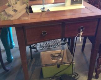 Singer Stylist sewing machine with cabinet $50.