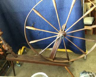 Vintage spinning wheel 45” on stand $125.