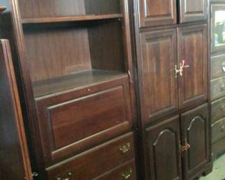 Shelf unit with fold down desk & 3 drawers, $75.; 6 door shelf unit $75.