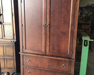 Armoire/entertainment center. 2 drawer with extra shelves & rod $225. OBO