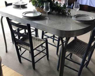 Vintage chrome & laminate table with 4 chairs. $175.
