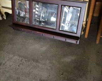 wall shelf/mirror with hooks$45.