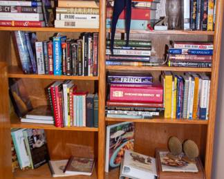 Assortment books and hats 