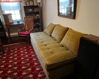 Upstairs library with a very cool sofa/bed. Rug is gorgeous.