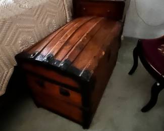 one of many wooden trunks...