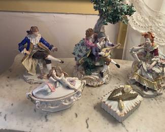 These fine porcelain pieces are signed and of the very best quality.