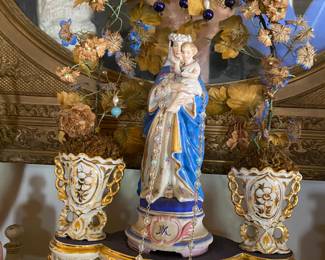 This piece is truly stunning. The dried rose surrounds the Blessed Mother with Christ in her arms. It's not huge but it is truly gorgeous. I've never run across one quite like this one.