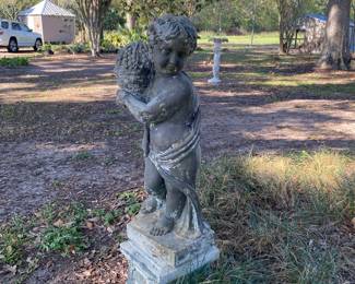 One of four large seasons statues. Over 3 feet tall each not including base. More very sweet statues throughout the property.