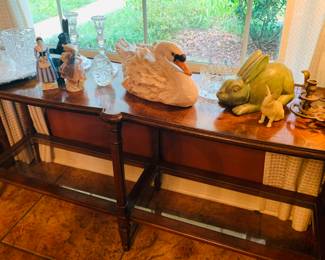 Very fine sofa table featuring porcelains and very fine crystal barware