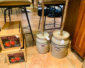 butter churns and old apple boxes with colored graphics