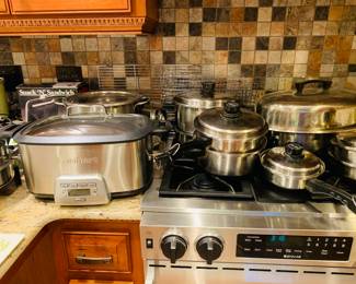 Large set of Westbend Lustre Craft Plus a never used Cuisinart 7 quart 4 in 1 slow cooker