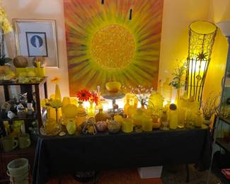 One complete side of a room full of yellow glass
