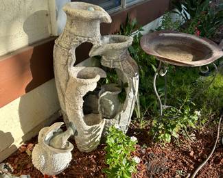 Birdbaths, plants, fountains, flowerpots and yard art.