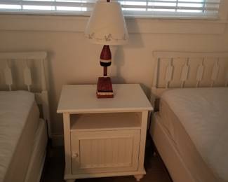 Matching nightstand; pair of buoy table lamps