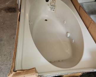 New, in-box jetted 5 foot bathtub