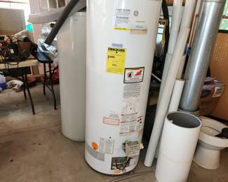 Natural gas powered water heater, appears to be unused