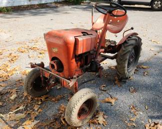 Vintage Jim Dandy Economy Tractor w/ belly mower, snow plow & wheel weights, pull start. Not currently running